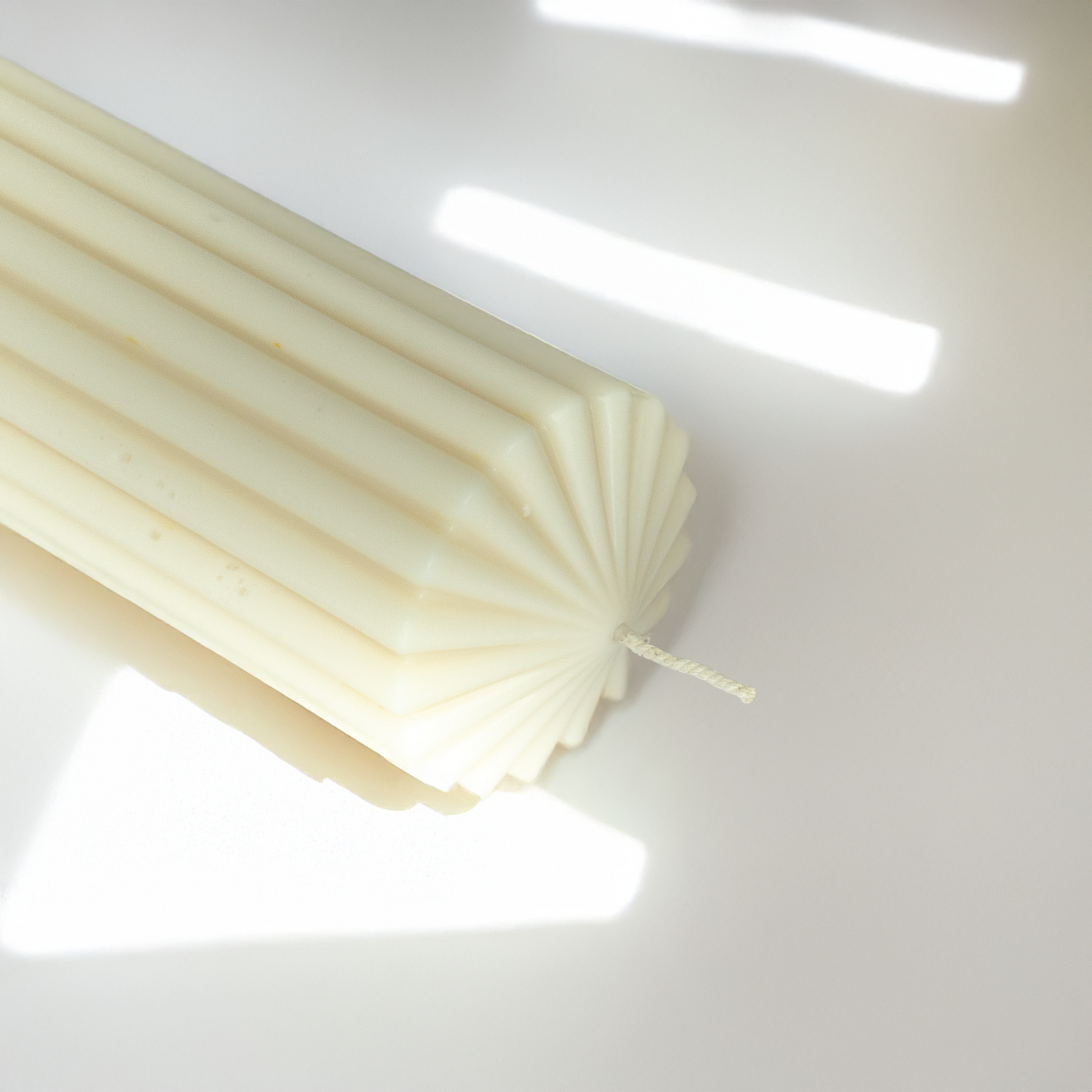 oomph candle, ribbed soy candle, sculptural candles, large decorative candle, designer home candles, aqua wave fragrance, hand-poured soy wax, long burning candles, Dayesy candle, centerpiece decor